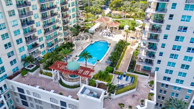 an aerial view of a city with lots of residential buildings