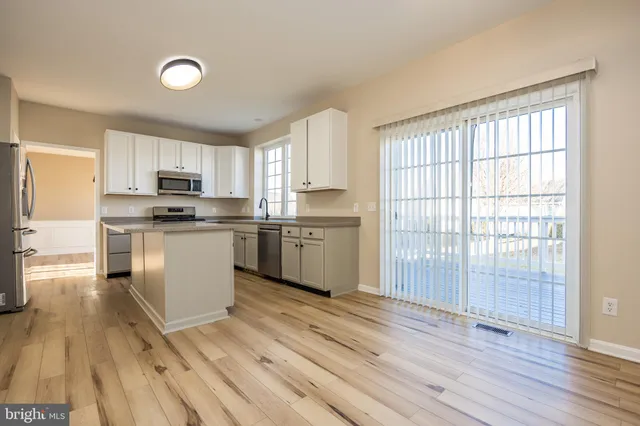 a living room with a fireplace