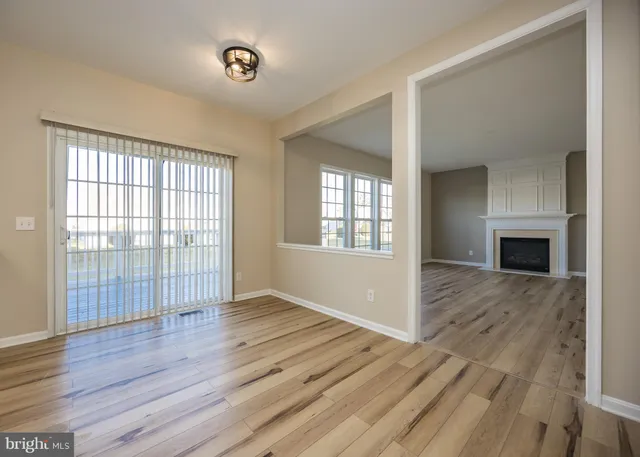 a bathroom with a sink a mirror and shower