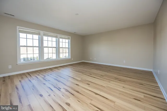 a bathroom with a double vanity sink mirror and