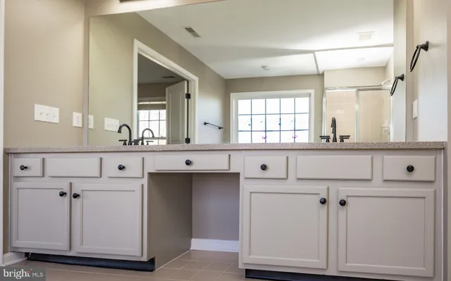 a bathroom with a sink a toilet and a bathtub