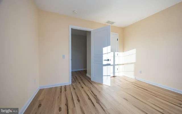 a view of a house with wooden deck