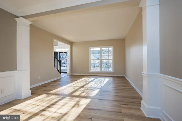 a view of a large window and a rug