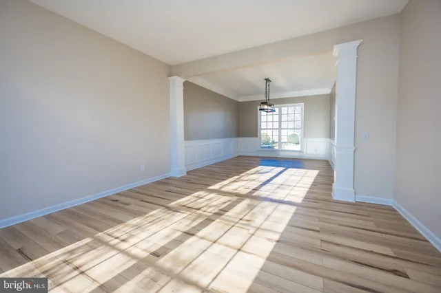 a stove top oven sitting inside of a kitchen