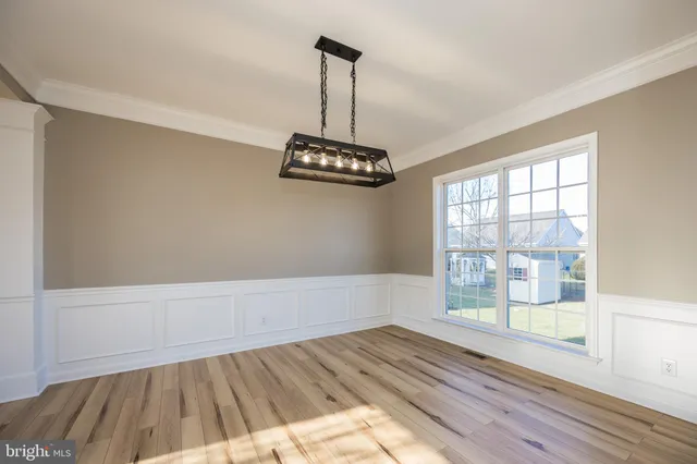 a kitchen with appliances and cabinets