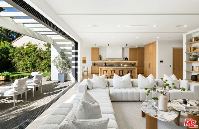 a kitchen with a stove and a sink
