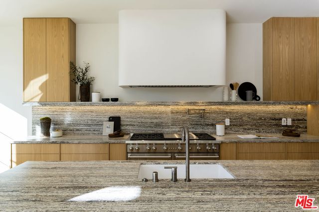 a vase of flowers sitting on a table