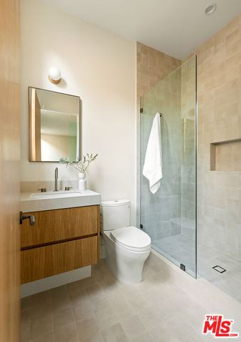 a view of living room with furniture and flat screen tv