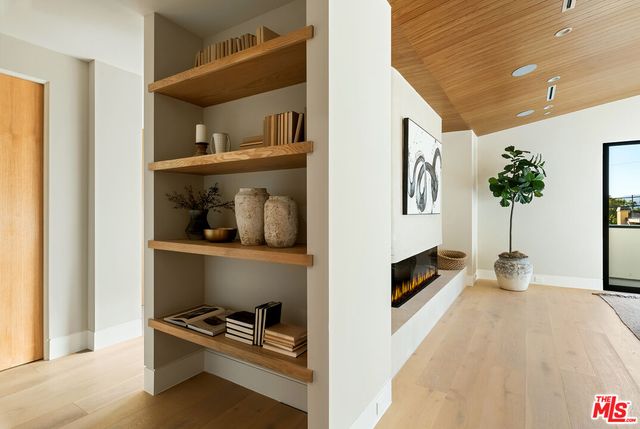 a view of a room with rack on the wall