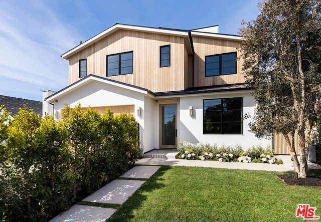 a front view of house with yard