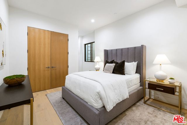 a view of a yard with chairs