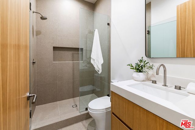 a view of a house with backyard porch and sitting area