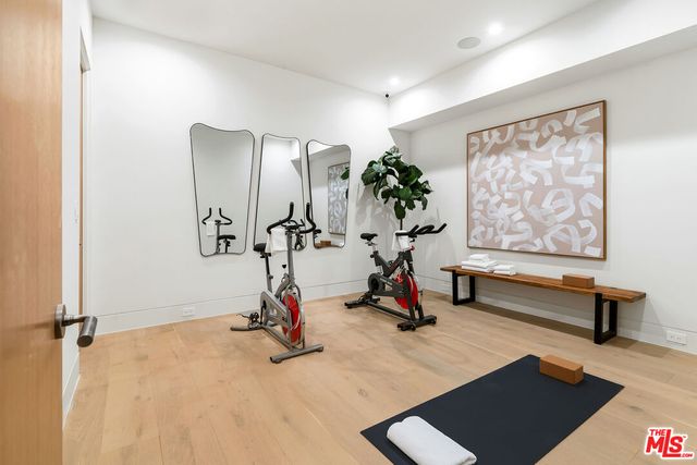 a view of a chairs and table in backyard