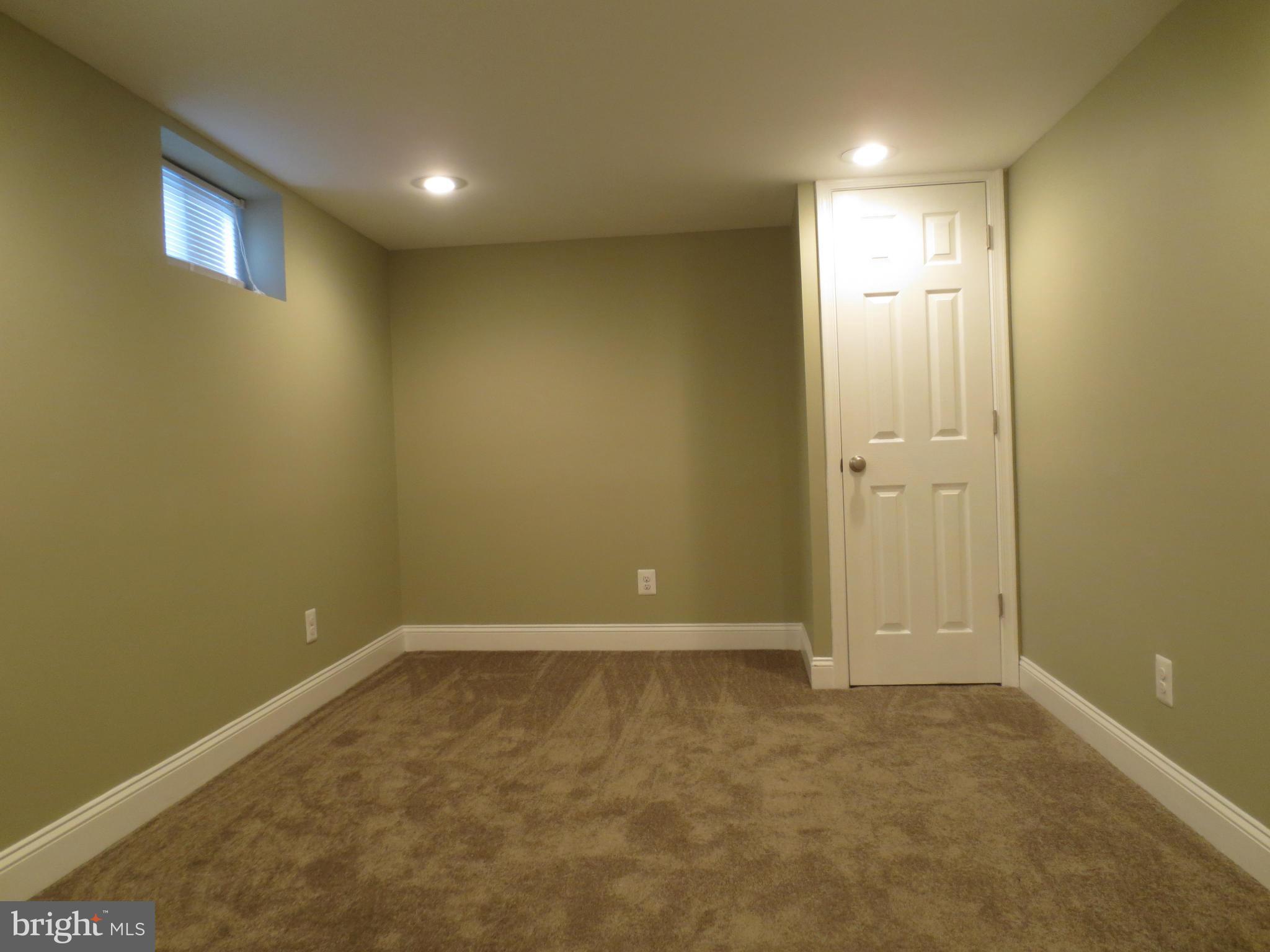 1704 Heathfield Road Baltimore, MD 21239 - Photo 21 of 28 Basement Suite Bedroom