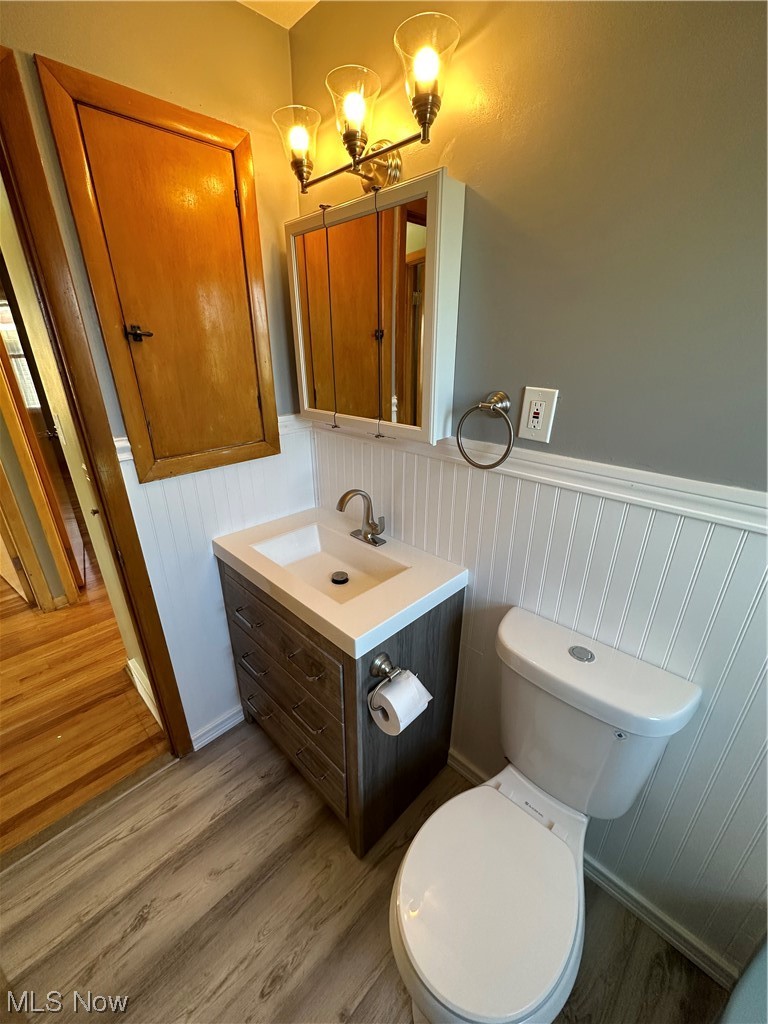 20626 Centuryway Road Maple Heights, OH 44137 - Photo 9 of 15 Bathroom with toilet, new vanity, and new LVP flooring