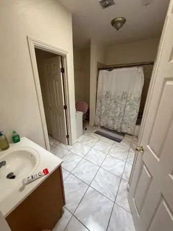 a room with furniture and a wooden floor