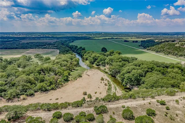 a view of a yard with an outdoor space
