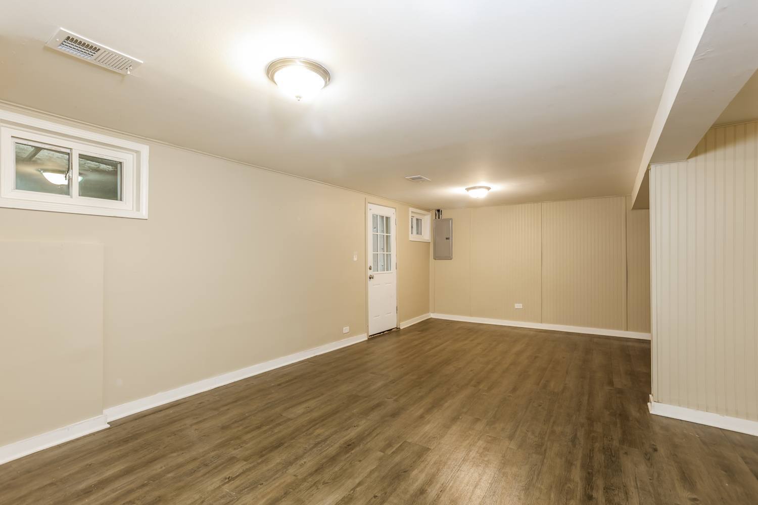 1462 Deerfield Road Deerfield, IL 60015 - Photo 12 of 14 a view of an empty room with wooden floor and a window