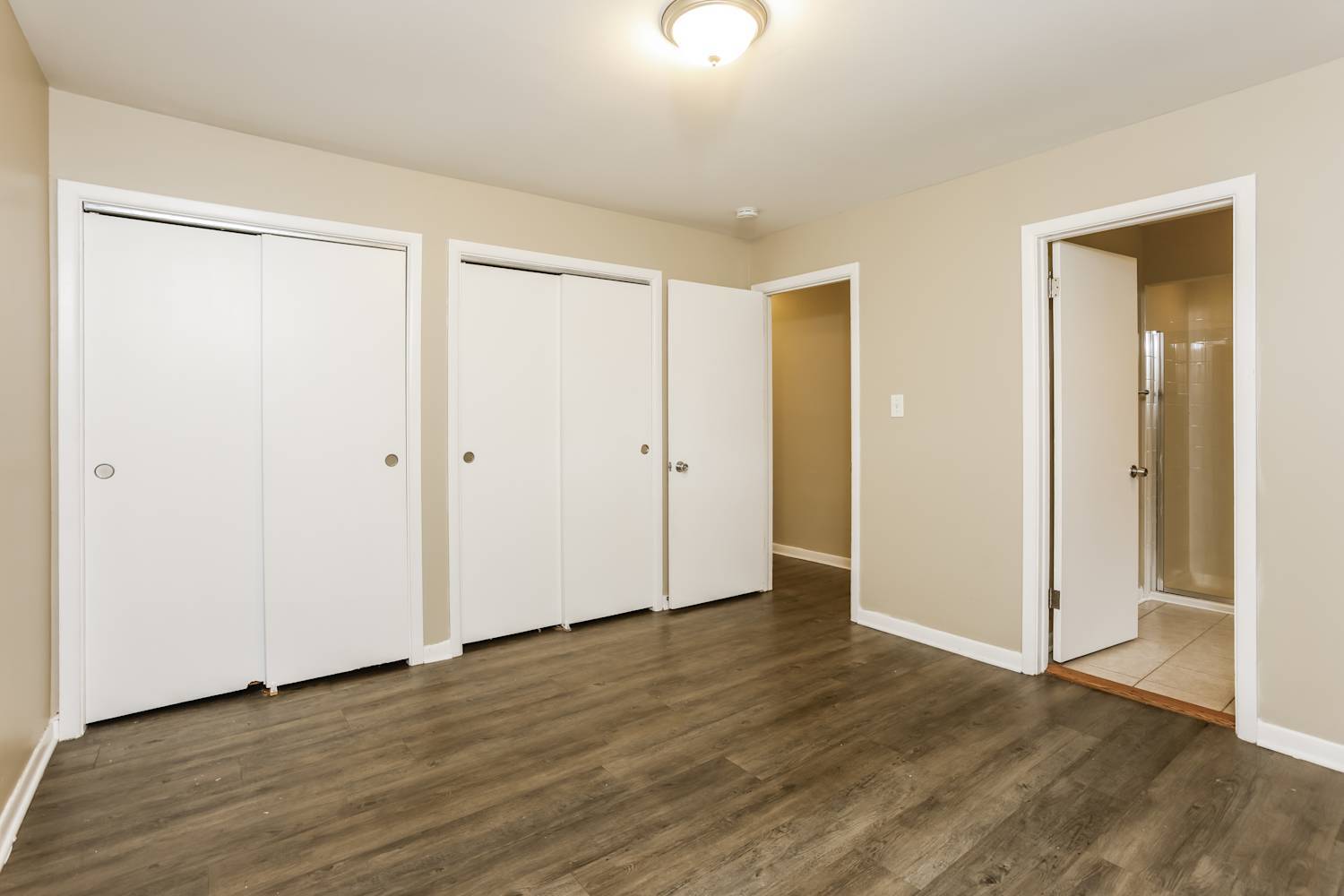 1462 Deerfield Road Deerfield, IL 60015 - Photo 5 of 14 a view of an empty room with wooden floor
