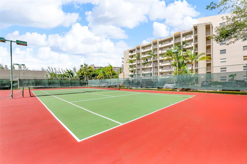 3940 Inverrary Boulevard, Unit 806A Fort Lauderdale, FL 33319 - Photo 32 of 36 a view of a tennis court