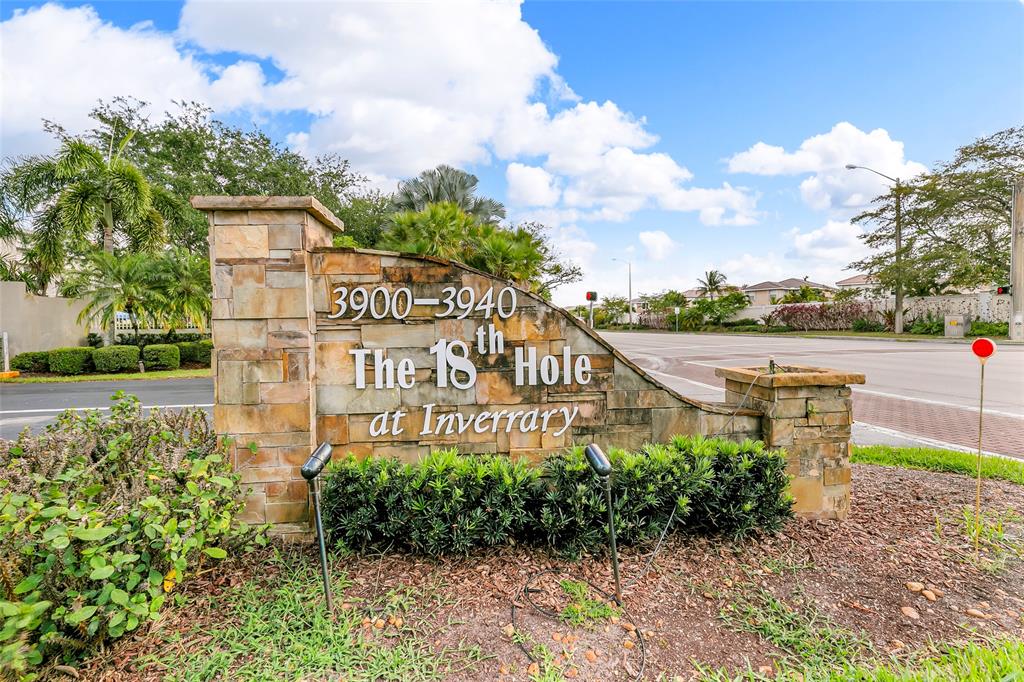 3940 Inverrary Boulevard, Unit 806A Fort Lauderdale, FL 33319 - Photo 33 of 36 a sign on the side of the road
