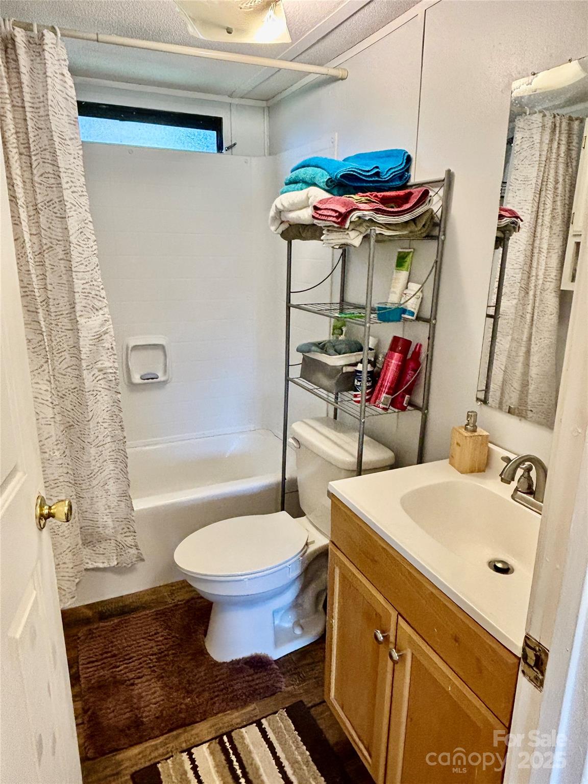 2830 Burgin Smith Road Vale, NC 28168 - Photo 11 of 38 a bathroom with a sink toilet and shower