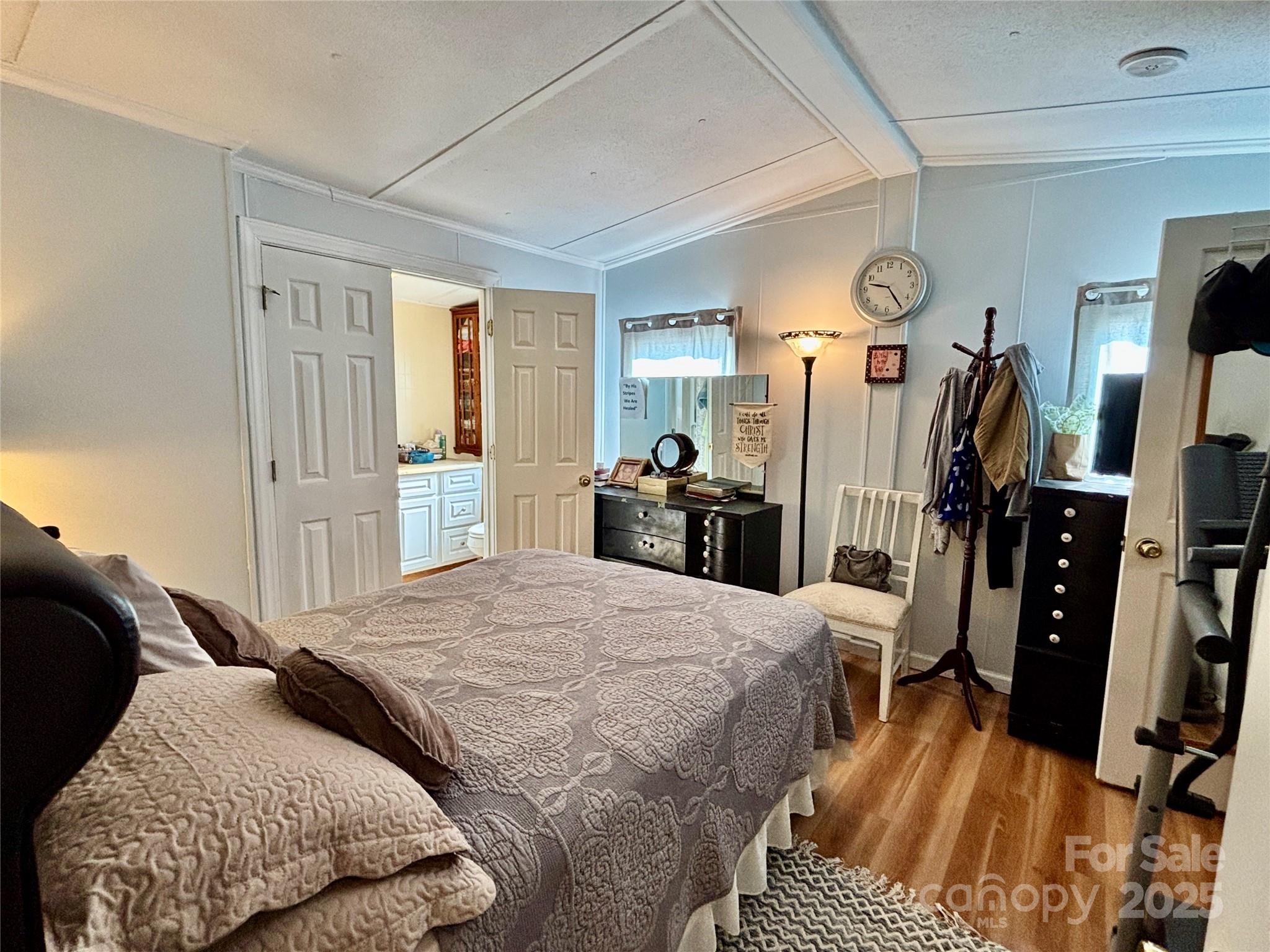 2830 Burgin Smith Road Vale, NC 28168 - Photo 13 of 38 a bedroom with two beds and a dresser