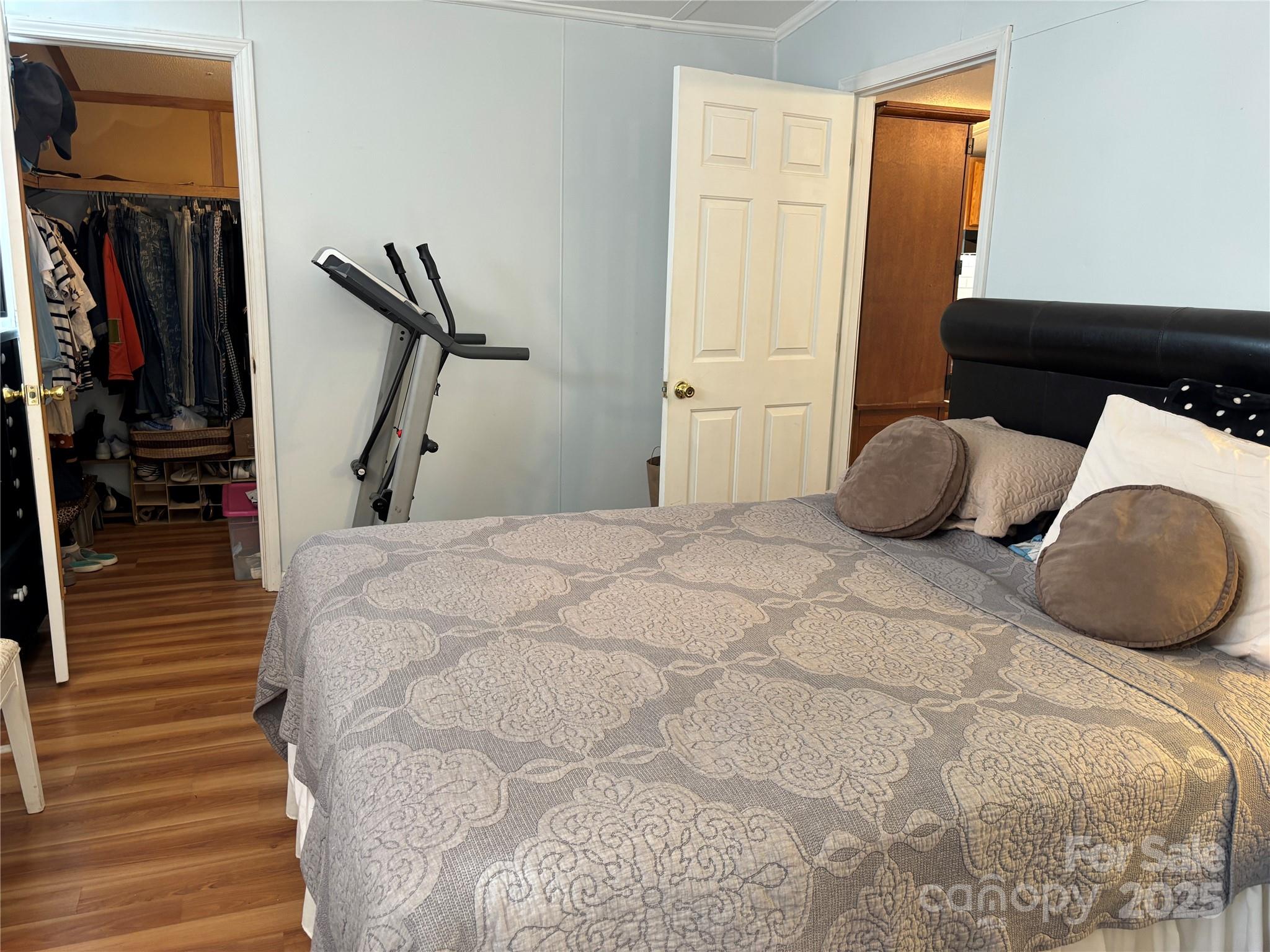 2830 Burgin Smith Road Vale, NC 28168 - Photo 14 of 38 a bedroom with a bed and a closet