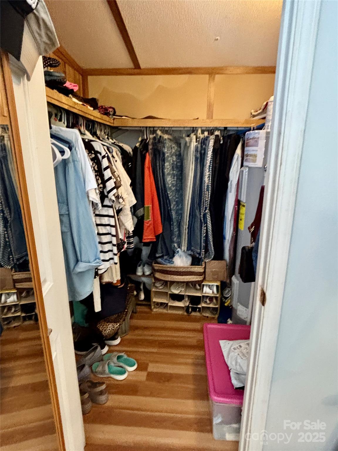 2830 Burgin Smith Road Vale, NC 28168 - Photo 15 of 38 a view of walk in closet with clothes