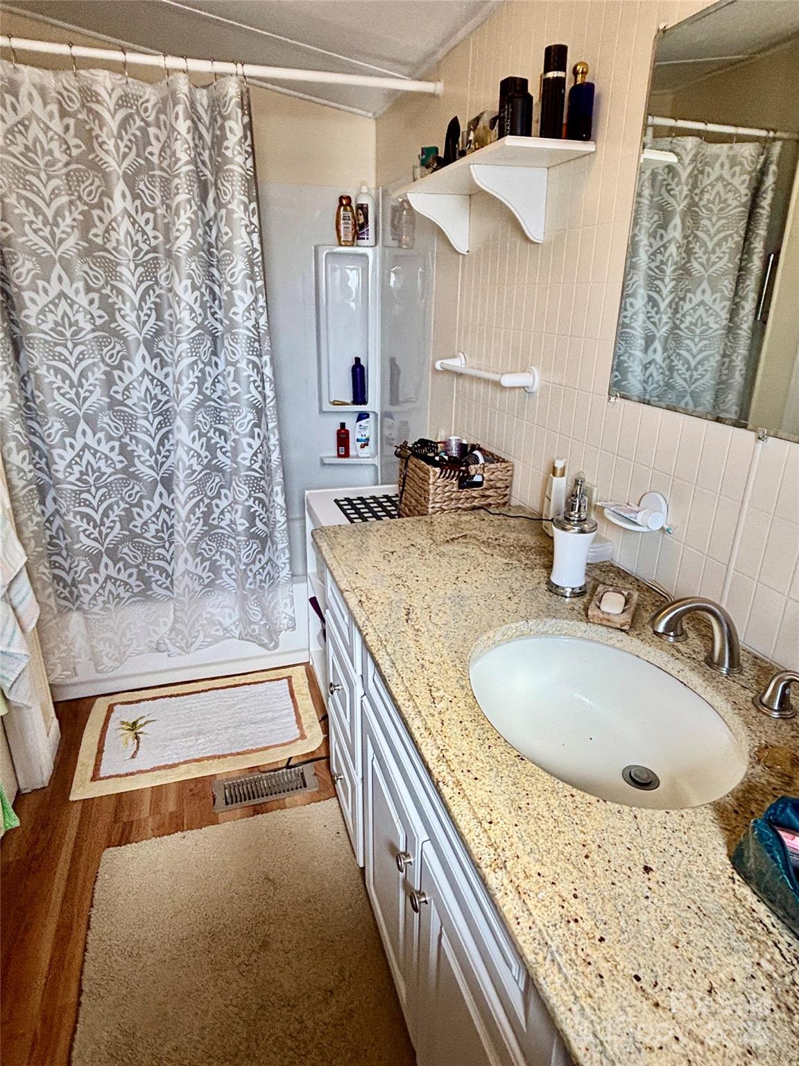 2830 Burgin Smith Road Vale, NC 28168 - Photo 17 of 38 a bathroom with a sink and a mirror