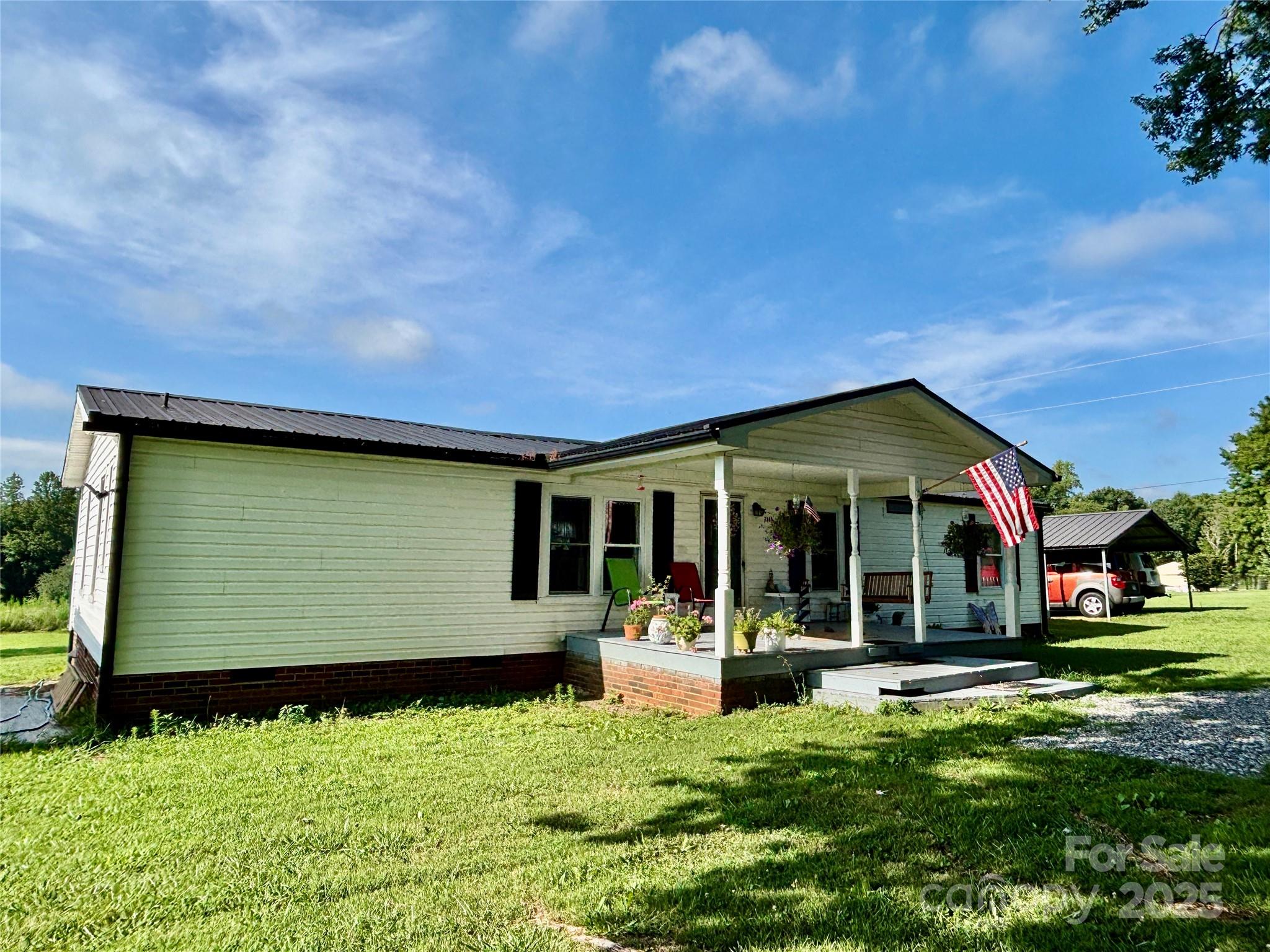 2830 Burgin Smith Road Vale, NC 28168 - Photo 28 of 38 a front view of a house with a yard