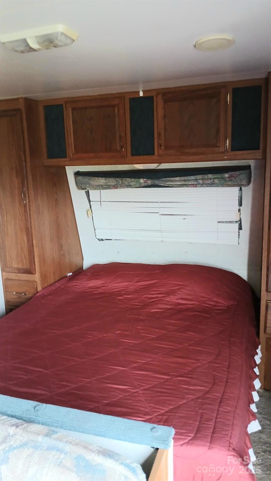 2830 Burgin Smith Road Vale, NC 28168 - Photo 36 of 38 a view of a room with wooden floor and cabinets