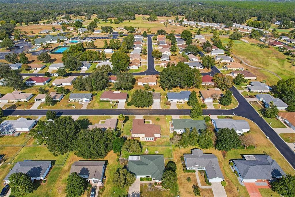 11263 Southwest 138th Lane Dunnellon, FL 34432 - Photo 39 of 53 an aerial view of residential houses with outdoor space