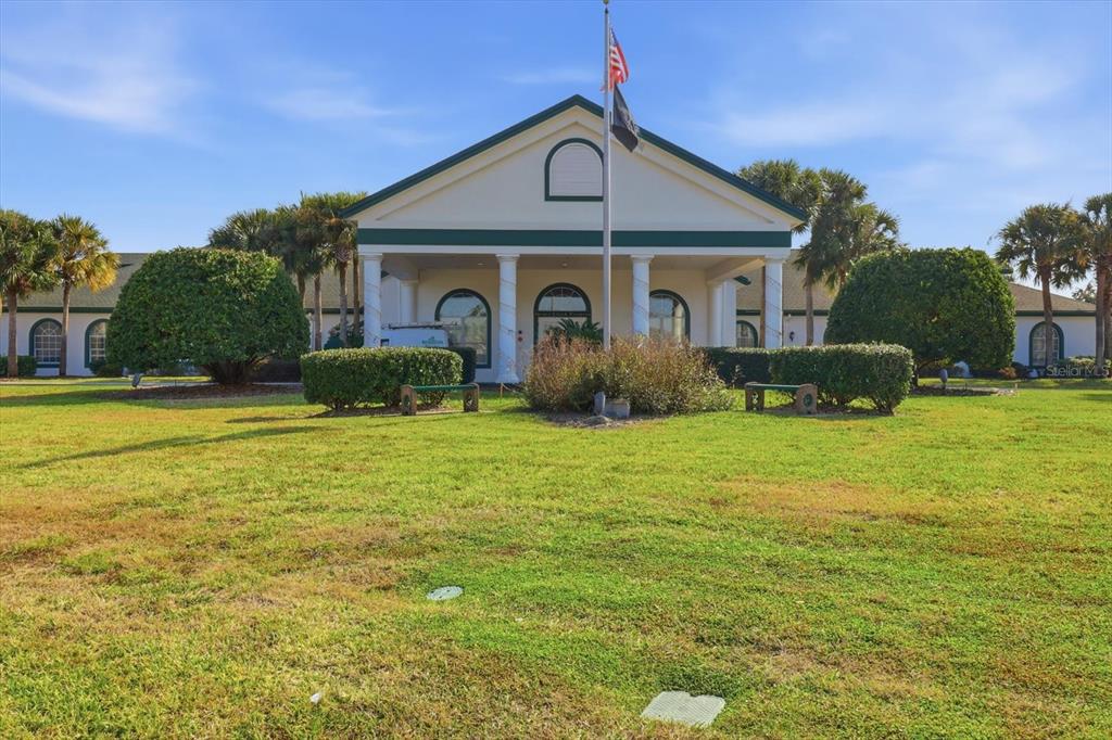 11263 Southwest 138th Lane Dunnellon, FL 34432 - Photo 45 of 53 a front view of a house with a yard