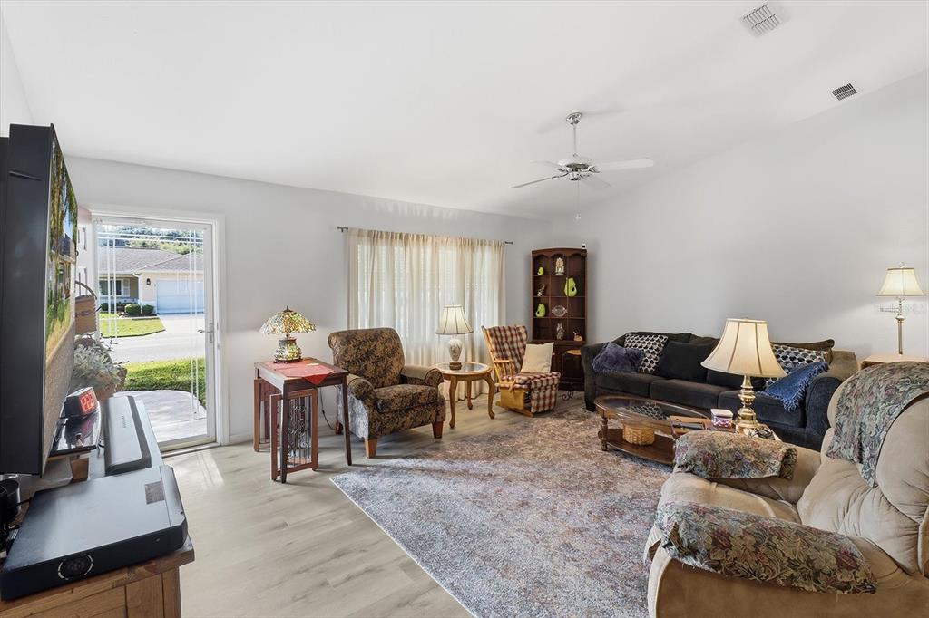 11263 Southwest 138th Lane Dunnellon, FL 34432 - Photo 6 of 53 a living room with furniture and a window