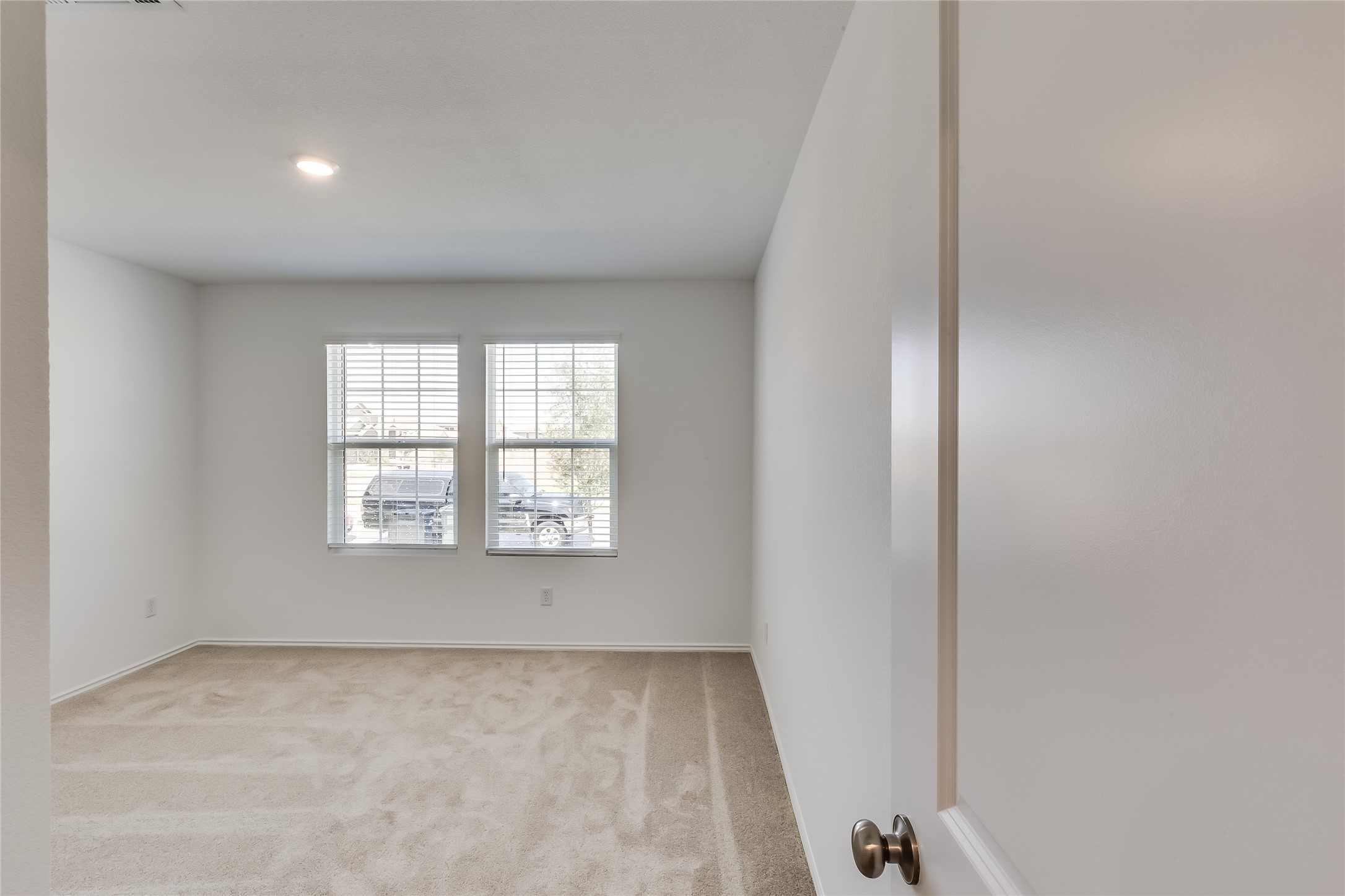 2000 Gilmer Way Leander, TX 78641 - Photo 24 of 39 Carpeted empty room with baseboards