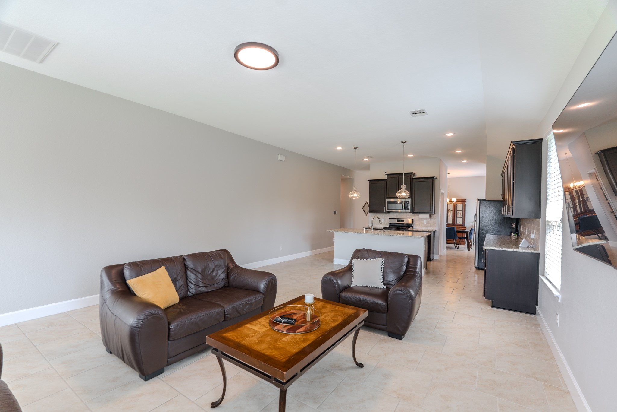 24322 North Newcastle Bay Trail Spring, TX 77389 - Photo 23 of 50 a living room with furniture and kitchen view