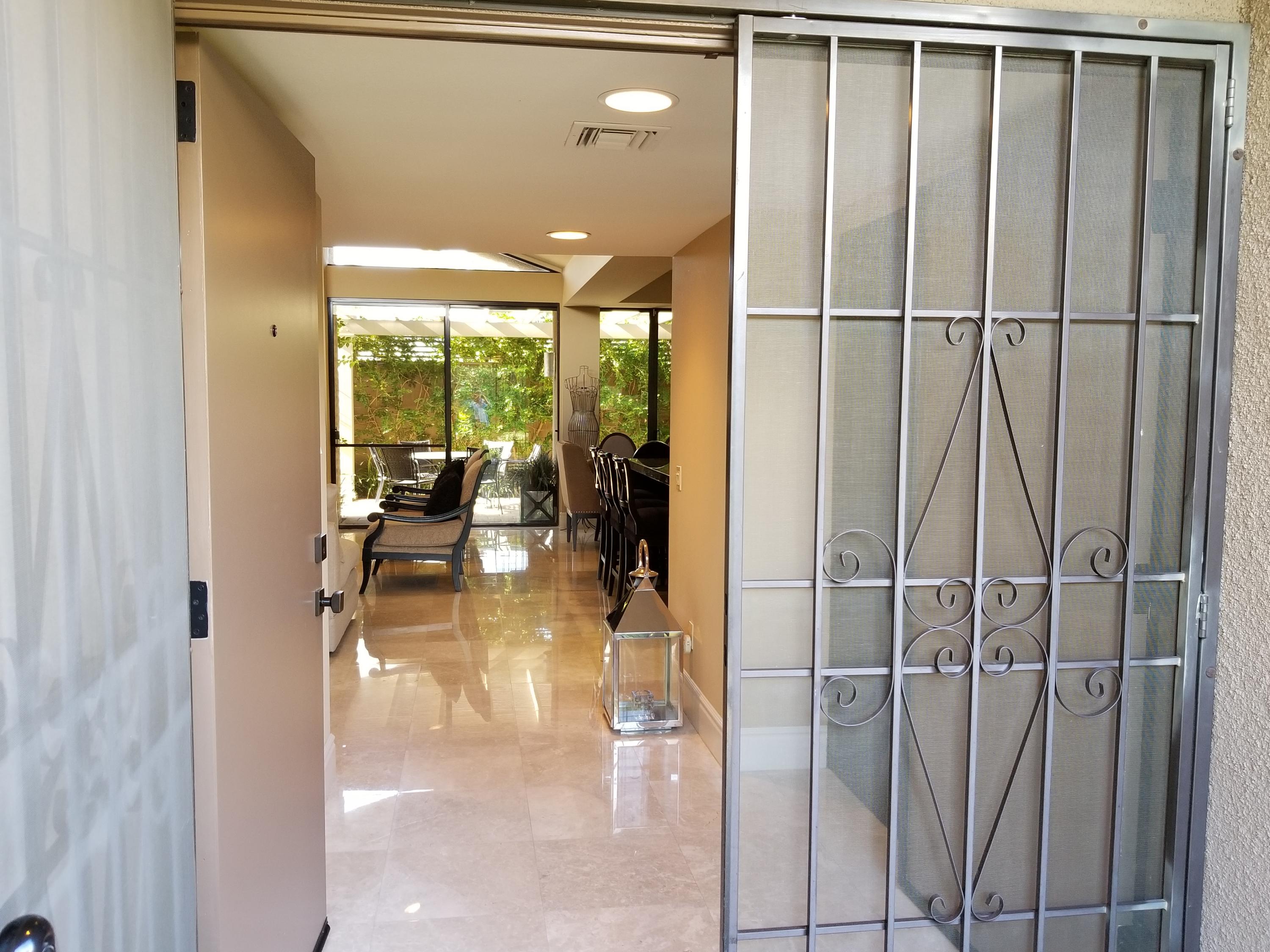 45735 Juniper Circle, Unit 522 Palm Desert, CA 92260 - Photo 2 of 53 a view of a very nice looking room with a large window