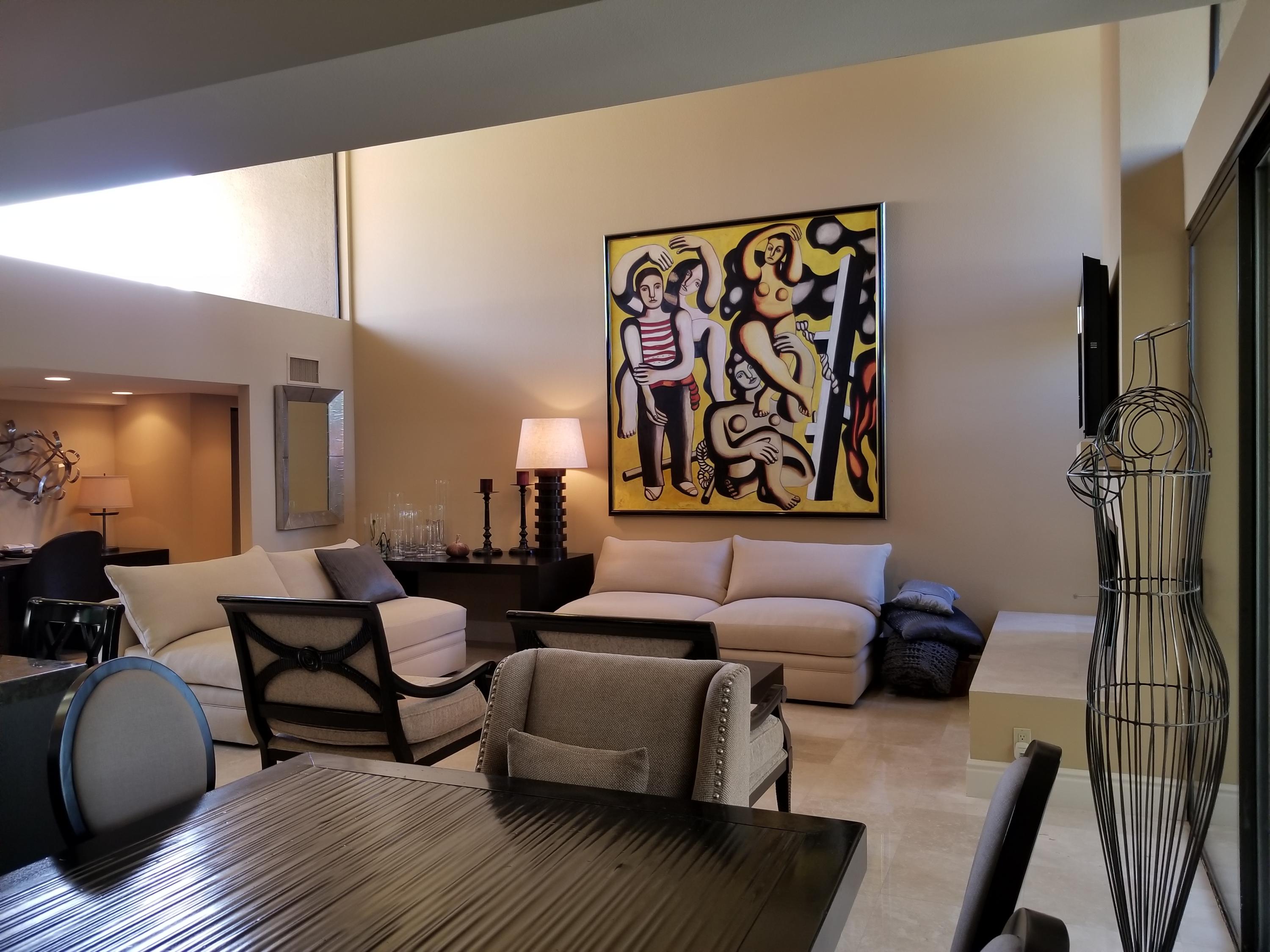 45735 Juniper Circle, Unit 522 Palm Desert, CA 92260 - Photo 11 of 53 a theatre with furniture and wooden floor