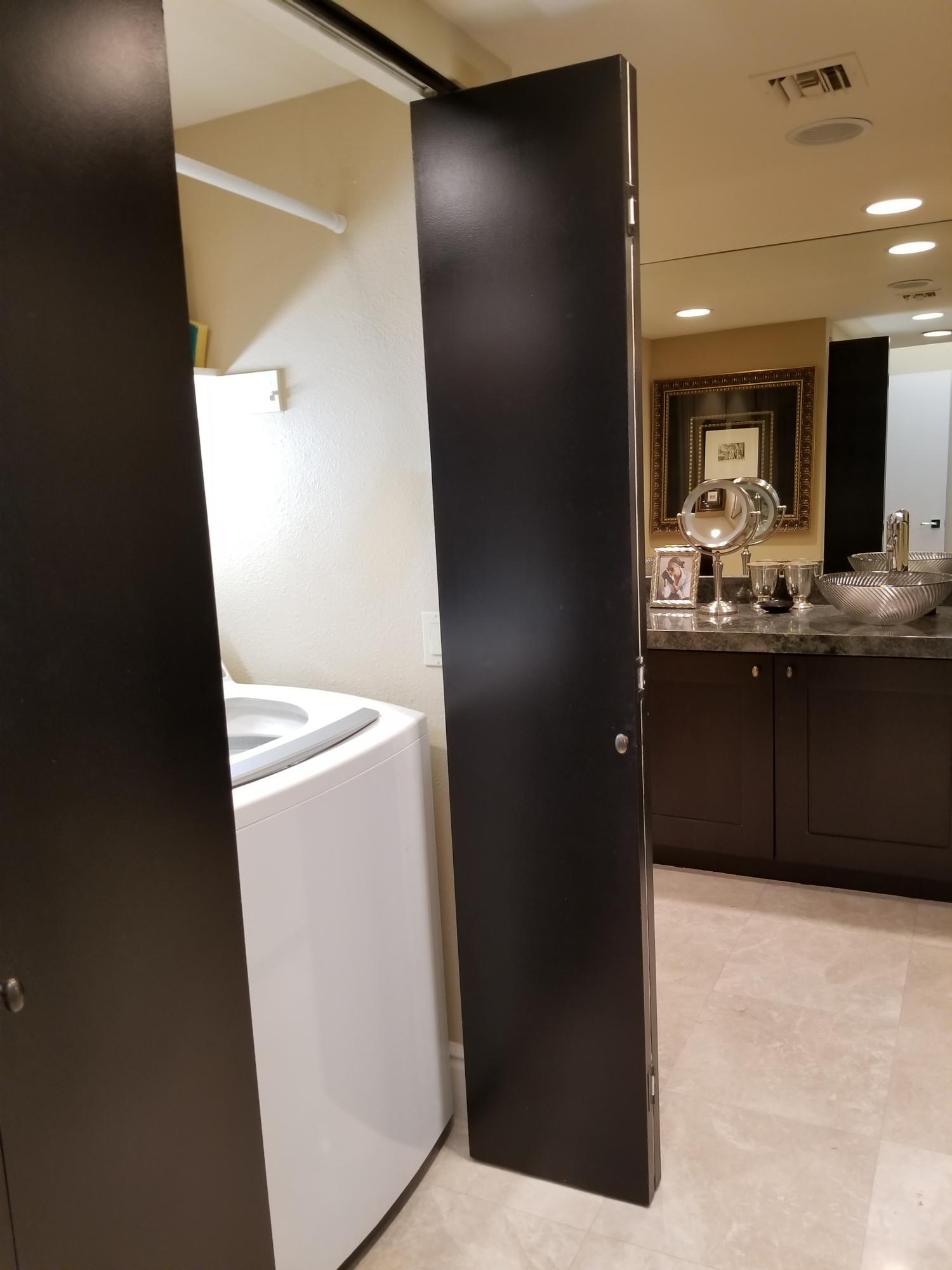 45735 Juniper Circle, Unit 522 Palm Desert, CA 92260 - Photo 27 of 53 a kitchen with a refrigerator and a sink