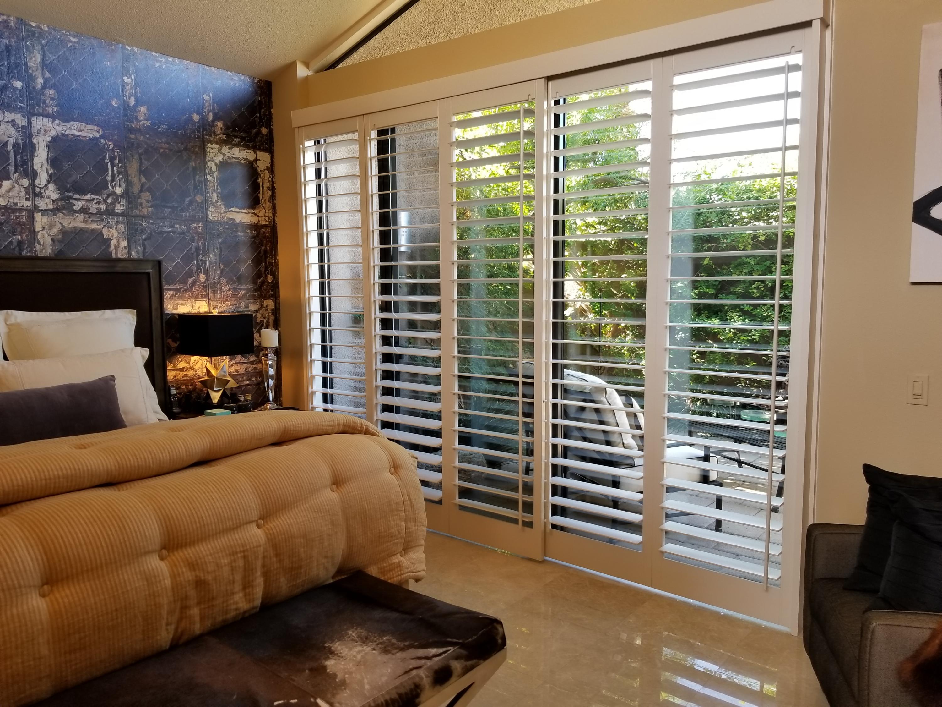 45735 Juniper Circle, Unit 522 Palm Desert, CA 92260 - Photo 33 of 53 a bedroom with furniture and a window