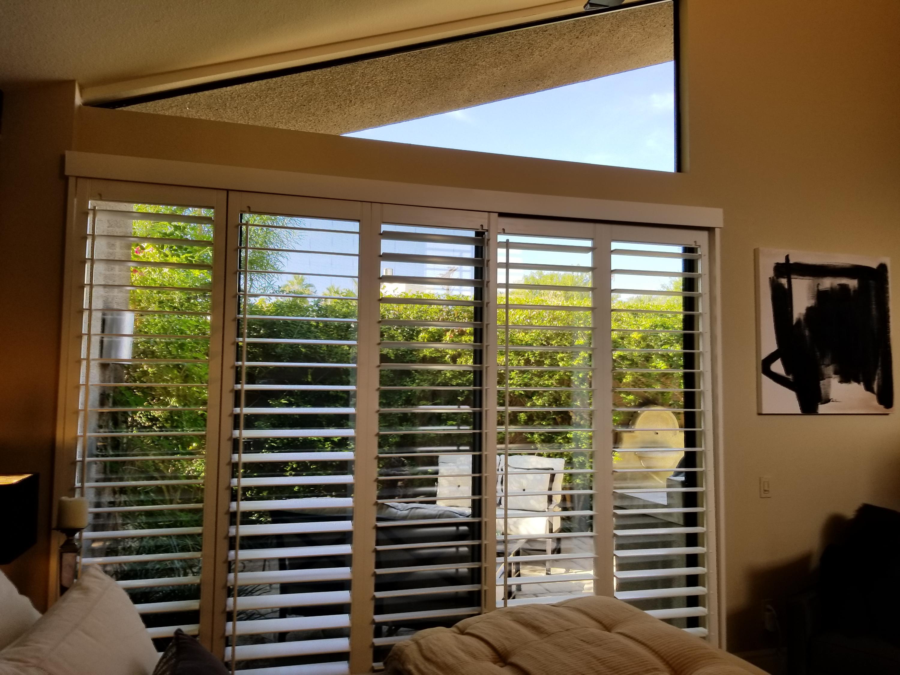 45735 Juniper Circle, Unit 522 Palm Desert, CA 92260 - Photo 34 of 53 a view of balcony and floor to ceiling window and wooden floor