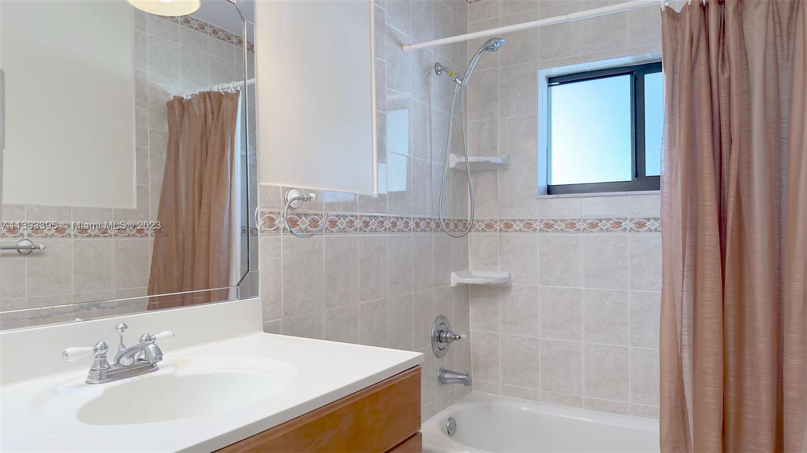 11412 Southwest 113th Place Miami, FL 33176 - Photo 16 of 16 a bathroom with a sink a toilet and shower