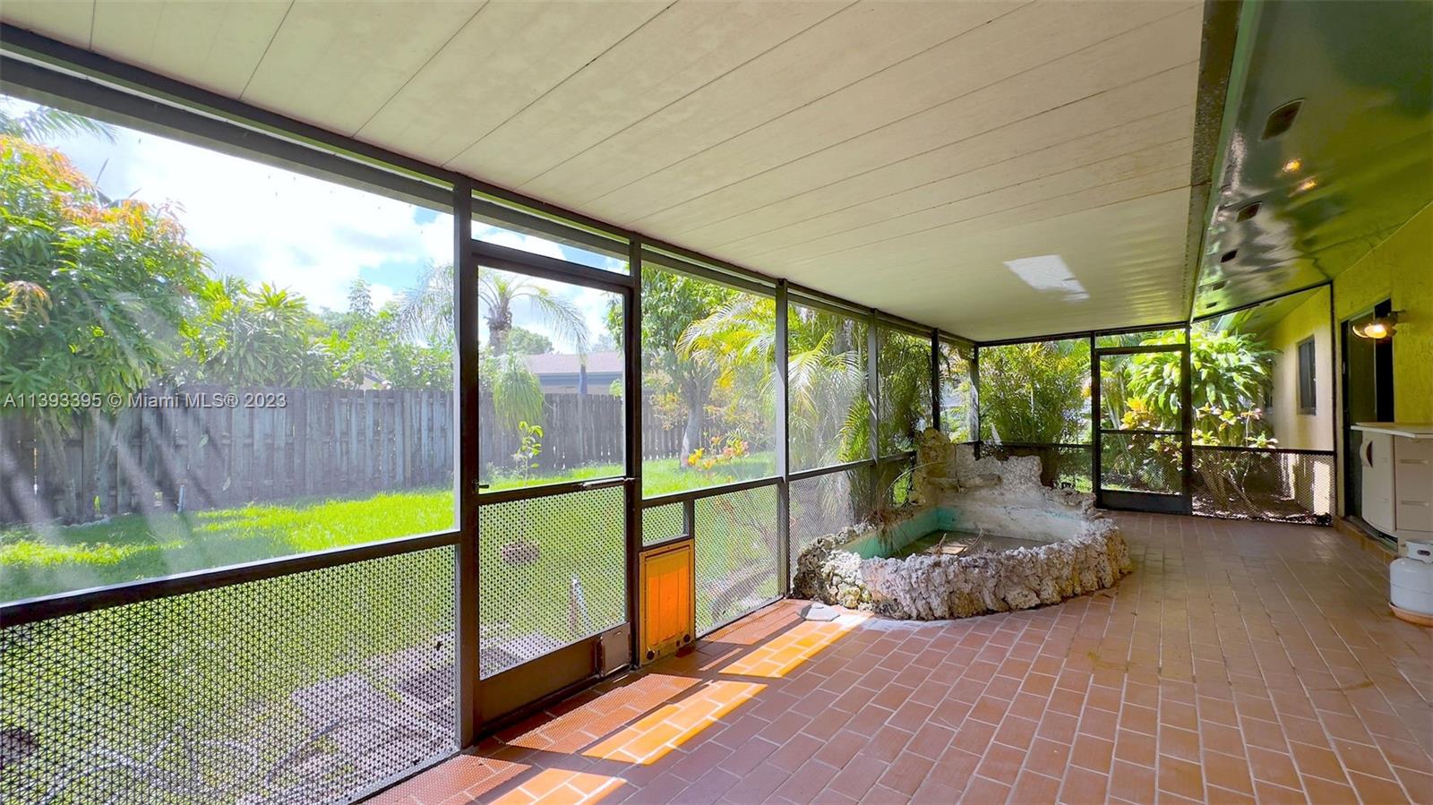 11412 Southwest 113th Place Miami, FL 33176 - Photo 10 of 16 a view of a garden