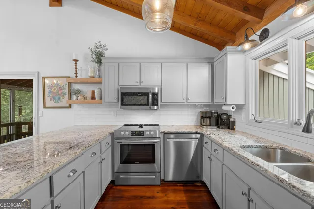 a bedroom with a bed and a walk in closet