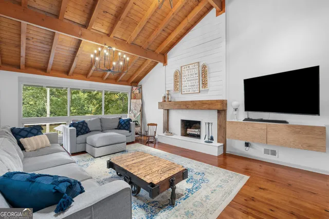 a bathroom with a sink double vanity granite and a mirror