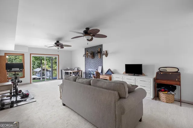 a view of a balcony with wooden floor