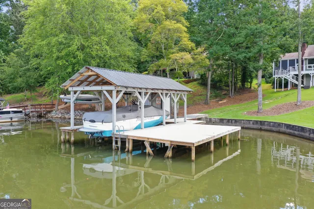 a view of a lake with sitting area