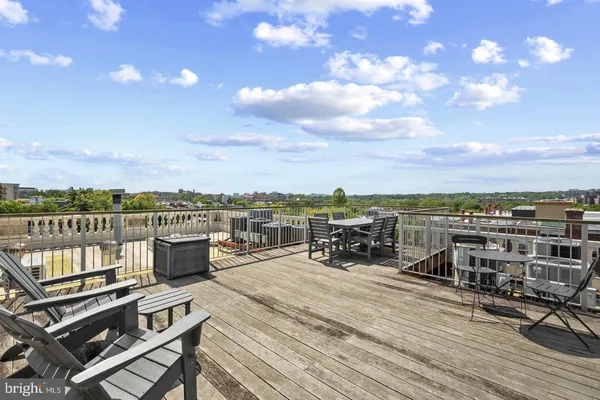 a view of a terrace with seating area