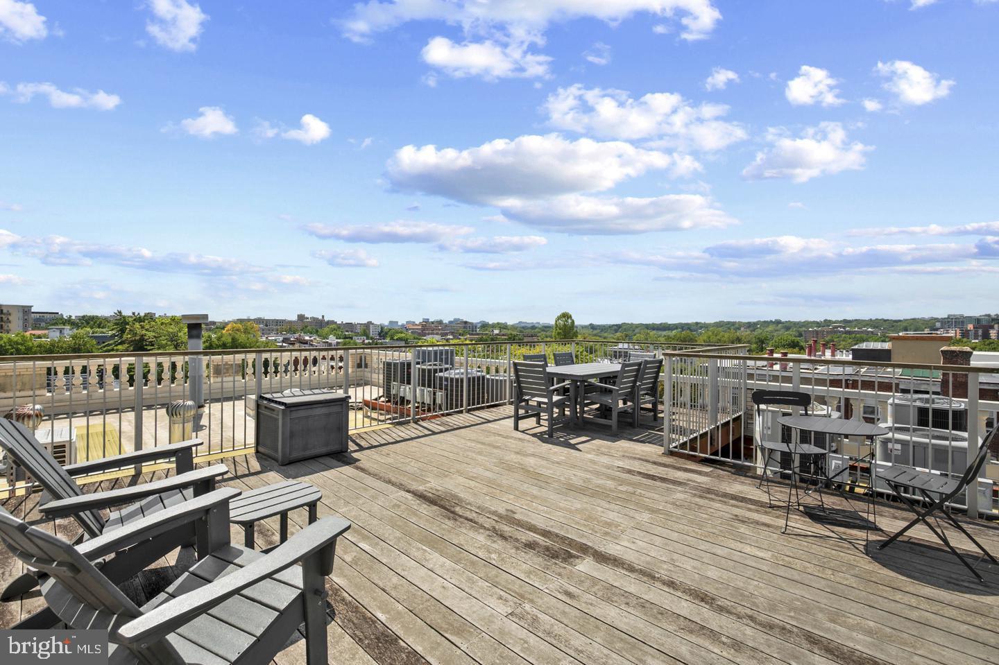 1801 Calvert Street Northwest, Unit 401 Washington, DC 20009 - Photo 6 of 23 a view of a terrace with seating area